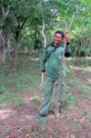 Our Komodo Park ranger holds a stick to protect us against the dragons